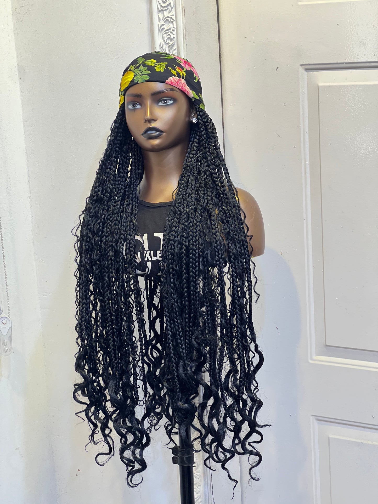 Black boho braids in black flowery scarf