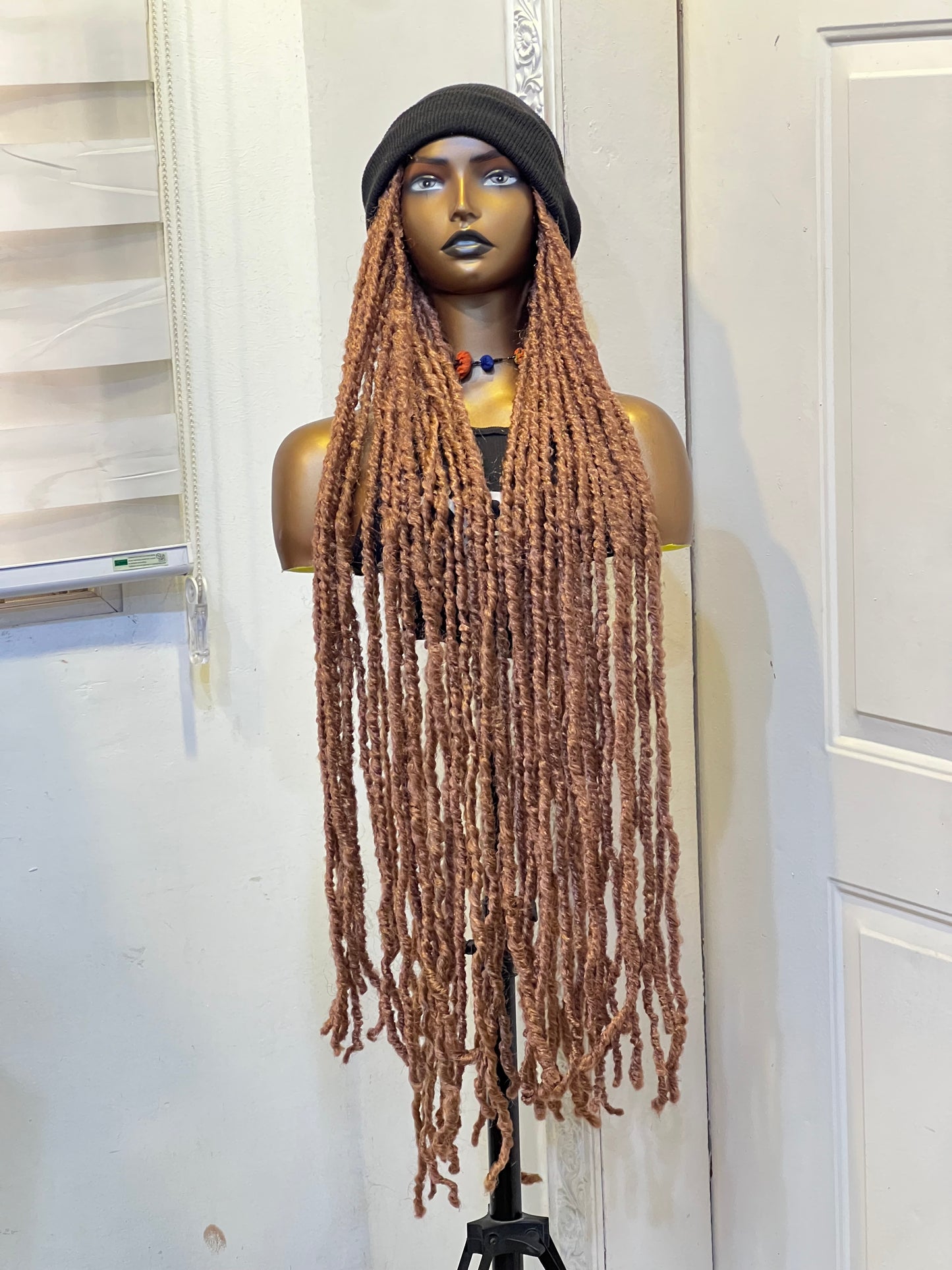 Beanie on brown long dreads