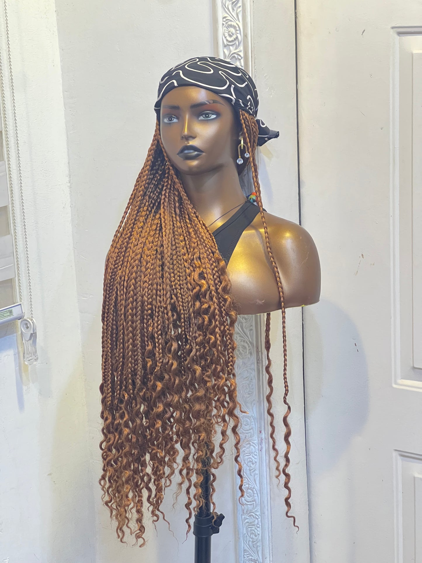 Brown braids on b/w scarf