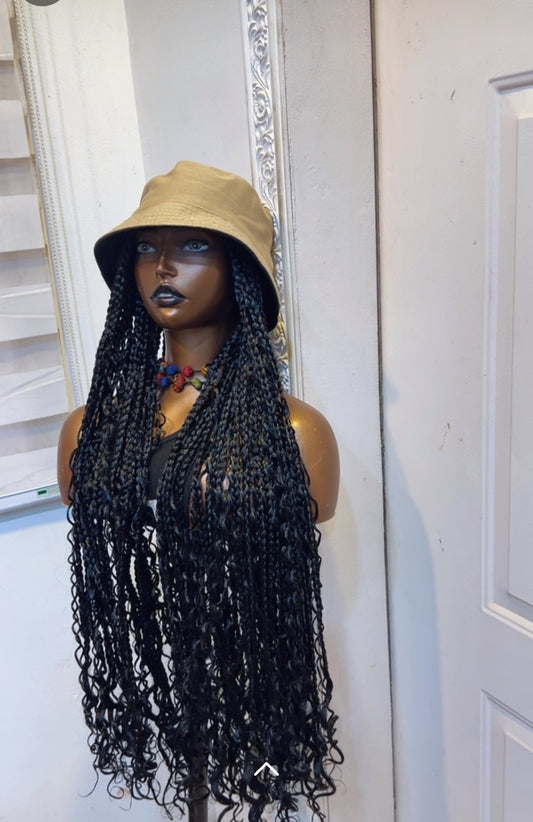 Carton color bucket on black boho braids