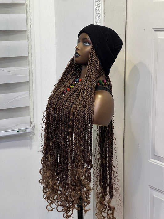 Brown boho braids on black beanie