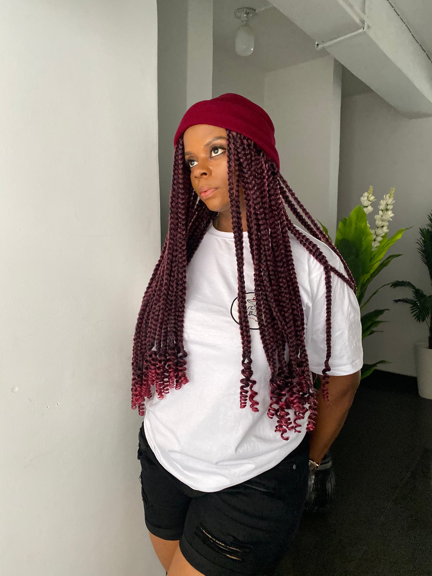 Wine beanie on wine boss braids