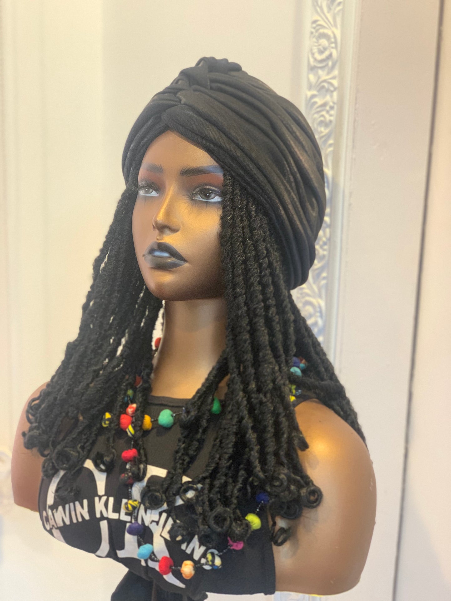 Black turban on short dreads