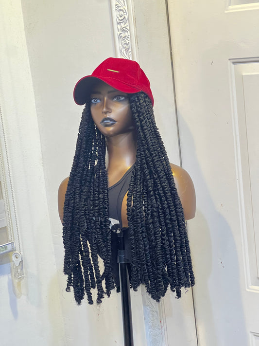 Red face cap on black fluffy locs