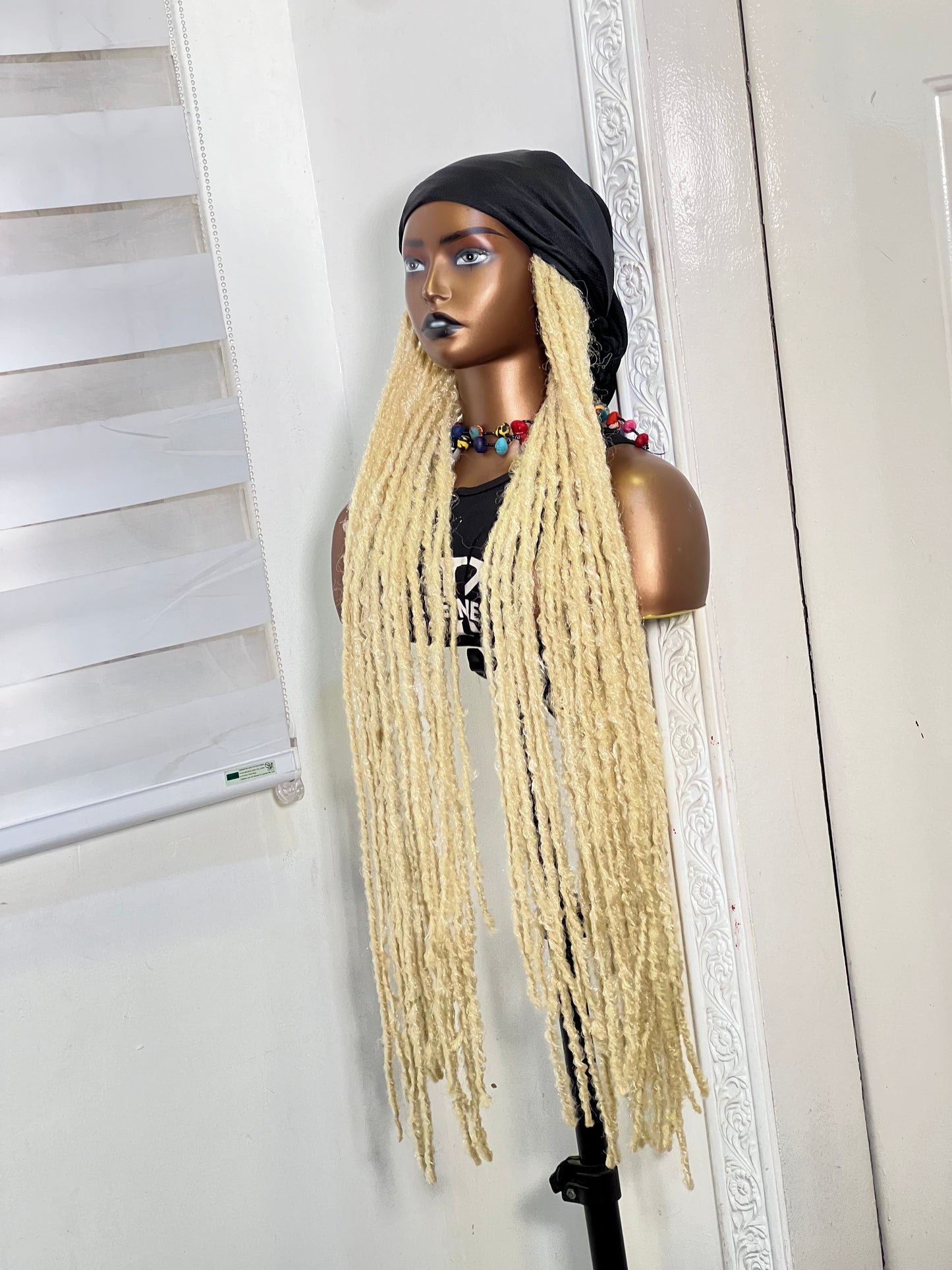 Long white dreads on black scarf