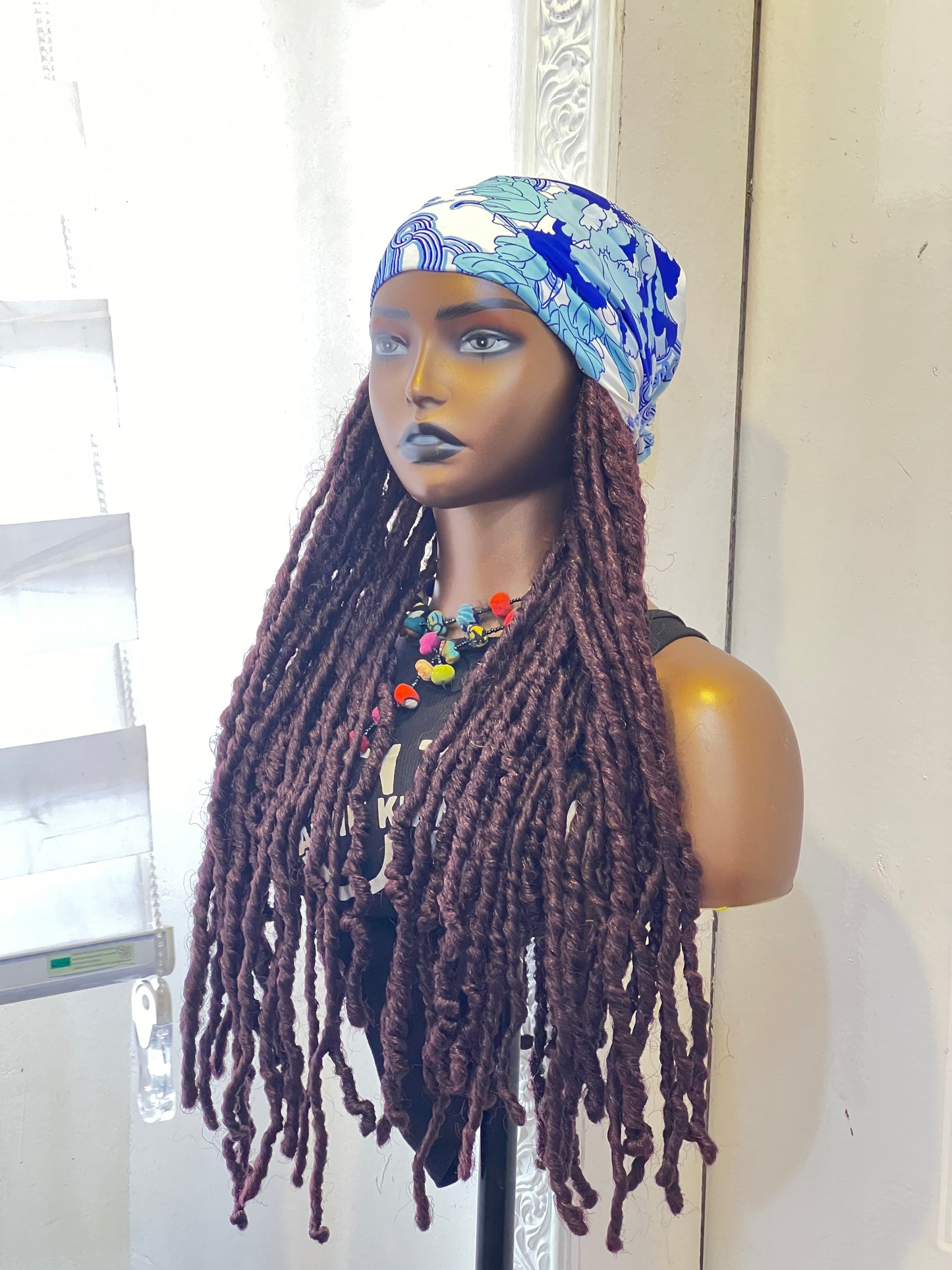 Wine medium dreads on blue flowery scarf