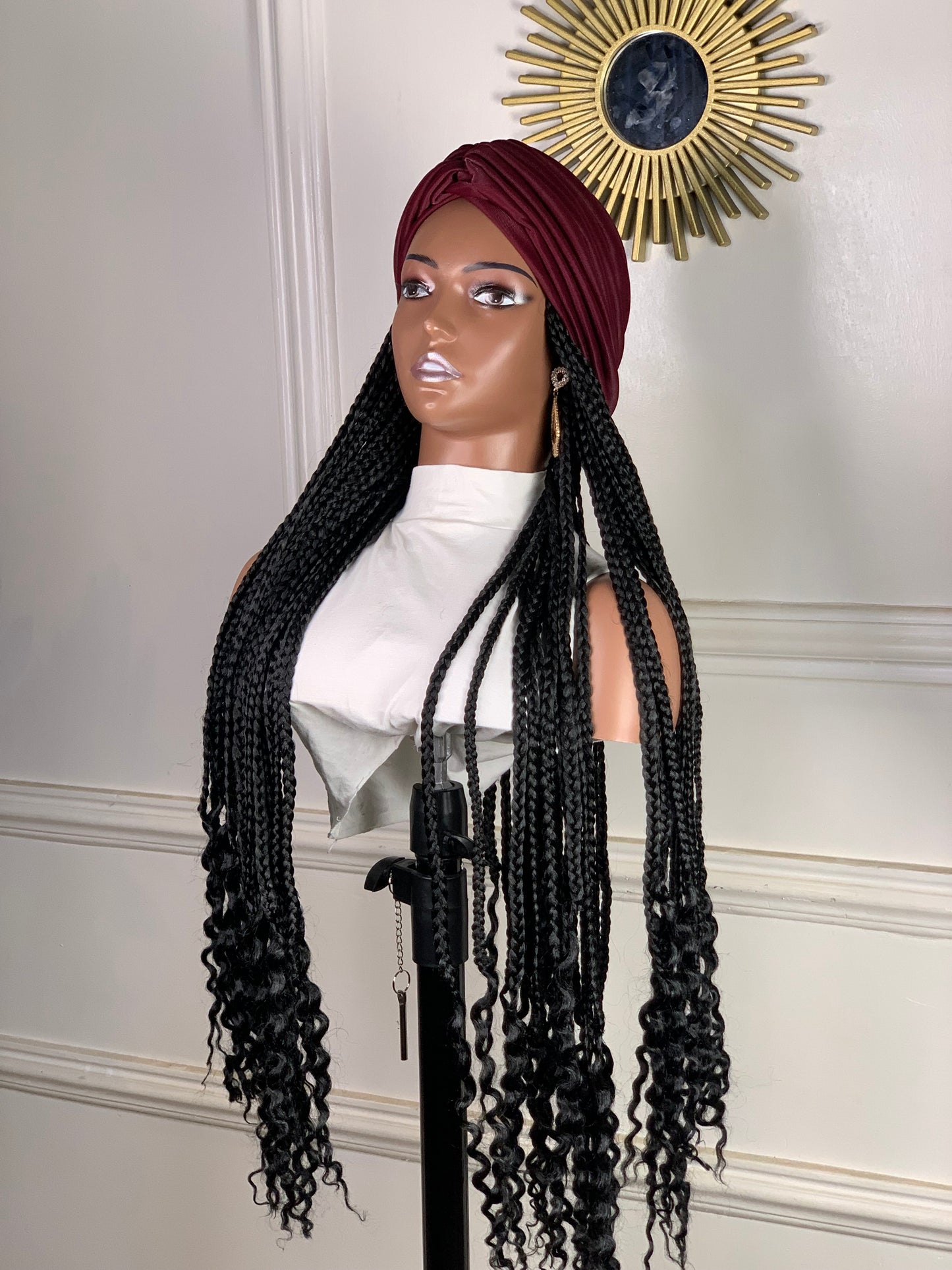 Burgundy turban in black braids