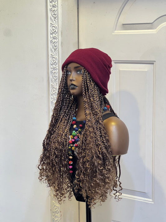 Wine beanie on medium brown boho braids