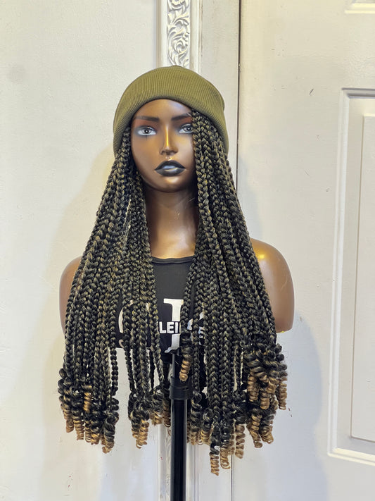 Army green beanie on boss braids