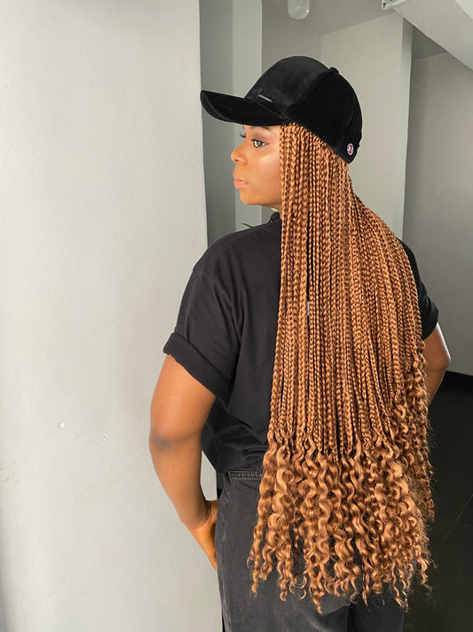 Brown braids in black face cap
