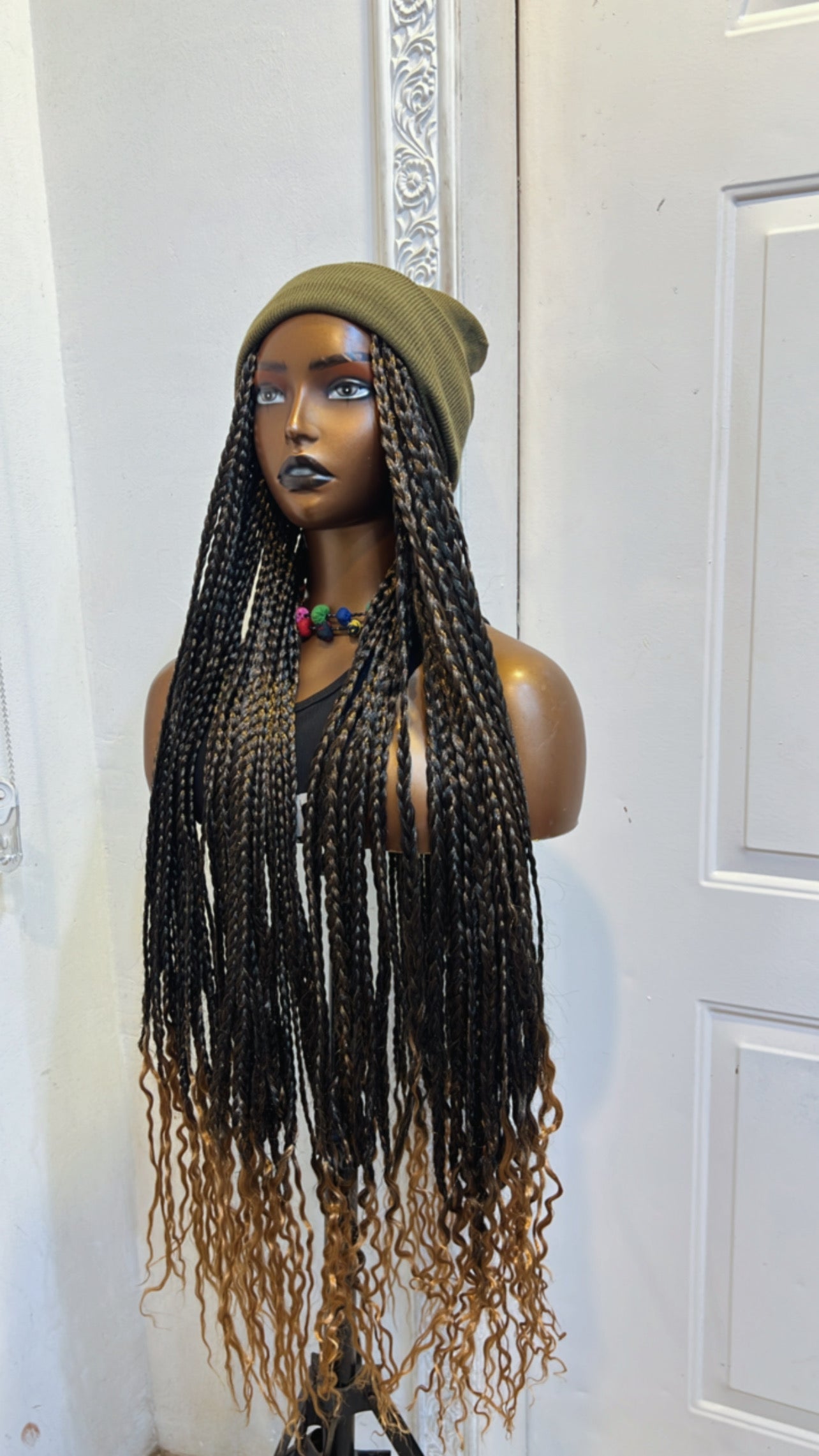 Army green beanie on mixed gold braids